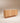 sculpted wooden storage cabinet
