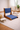 low wooden accent chair