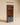 Luxury lifestyle setting featuring premium wooden main gate in walnut color finish, modern gate design for elegant home entrance and trending wooden furniture aesthetics