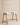 White wooden study table with two drawers and open shelf, natural wood A-frame trestle legs — handcrafted study desk made in India.