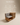 Wooden bench-chair with built-in cane-front side cabinet, open shelf storage and grey upholstered cushions — handcrafted accent seating made in India.