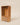 Wooden mandir cabinet with carved jali lattice sides, arched alcove and cane-front drawers, walnut finish — handcrafted wooden pooja unit made in India.