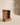 Wooden display shelf cabinet with carved lattice jali back panel, open shelves and bottom drawer, walnut finish — handcrafted wooden mandir-style unit made in India.