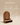 Wooden mandir-style stand with arched layered back panel, raised platform and open storage drawer, walnut finish — handcrafted wooden idol stand made in India.