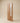 Premium wooden entrance door front view featuring vertical slat design with elongated glass panel, modern residential main door in natural walnut finish