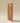 Premium wooden main gate front view in walnut finish with layered panel detailing, stylish main gate and premium residential wooden entrance design