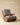 Curved wooden rocking armchair with grey corduroy cushions, handcrafted in India – premium teak rocking lounge chair