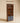 Luxury lifestyle setting featuring premium wooden main gate in walnut color finish, modern gate design for elegant home entrance and trending wooden furniture aesthetics