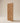 Premium herringbone wooden main gate front view in natural teak finish featuring chevron pattern craftsmanship, contemporary residential entrance door design and elegant architectural styling