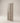 Premium solid wood main door front view featuring sculptural vertical arched recessed groove design in warm beige matte finish, modern wooden entrance door for luxury homes and contemporary villas