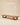 Low long wooden coffee table with live-edge top and angled legs, handcrafted in India – solid wood floor-height bench table