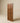 Premium solid wood main door with eight recessed square panels, rich walnut finish, symmetrical geometric design, and contemporary craftsmanship