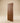 Premium solid wood main door with a herringbone wood panel design, rich walnut finish, bold vertical frame, and contemporary ribbed pull handle