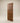Premium solid wood main door with ten recessed square panels, rich walnut finish, modern geometric design, and a sleek vertical pull handle